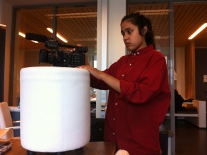 Setting up the camera on a... stool? Pillow?